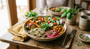 A high-angle, professional editorial photograph of a vibrant, colorful plant-based balanced meal on
