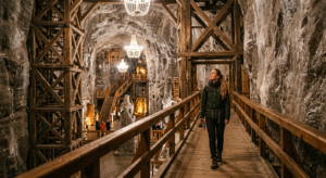 A professional, high-resolution editorial photograph of a tourist exploring a majestic, softly illum